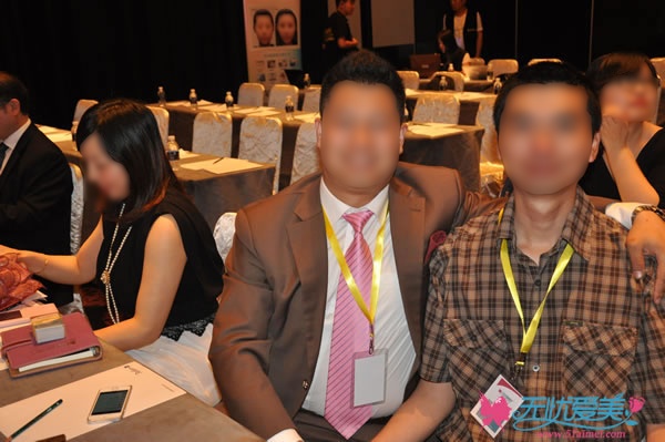 无忧爱美网林魁经理与非常爱美网总裁合影